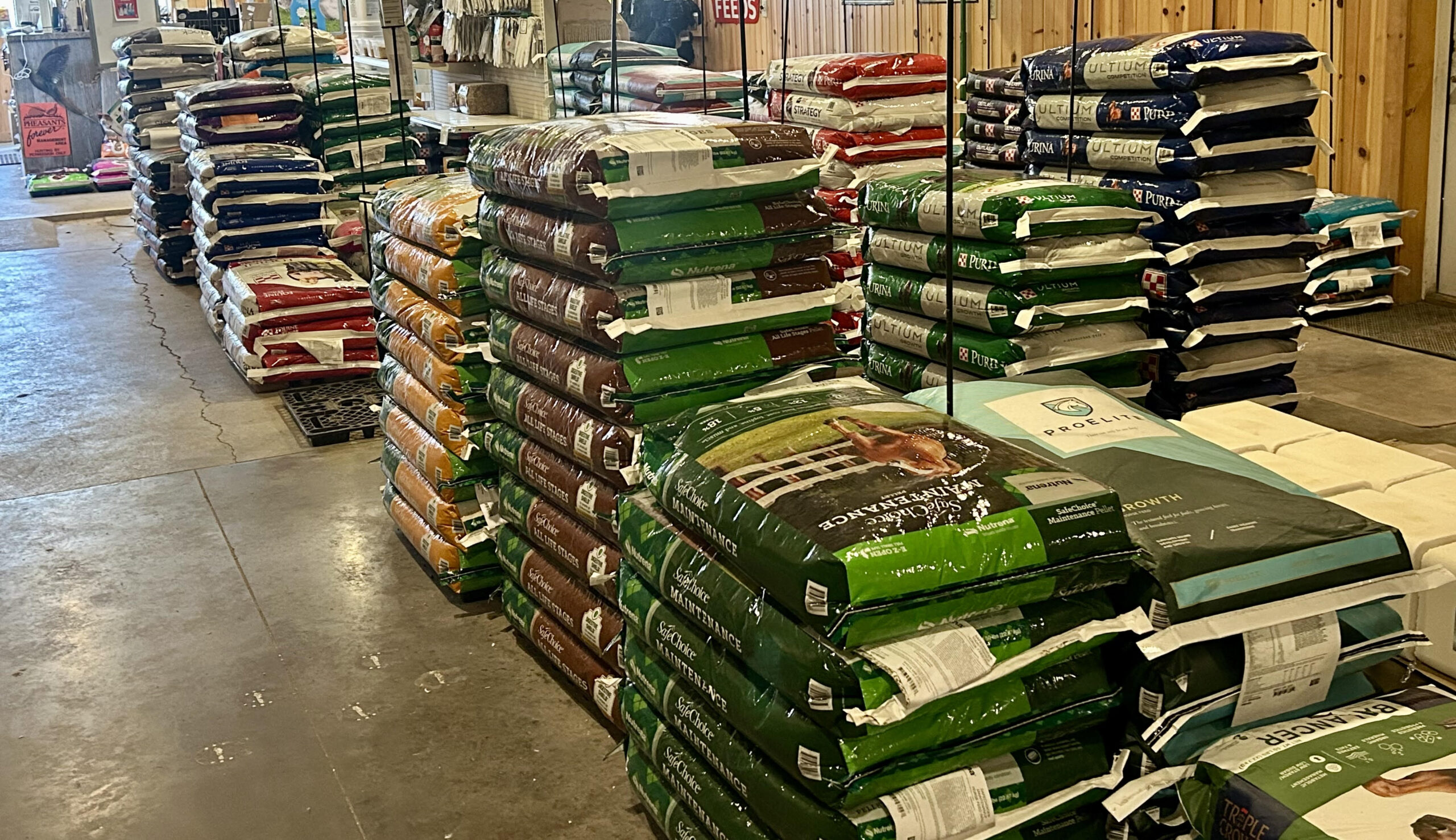 Stacked bags of horse feed at the store